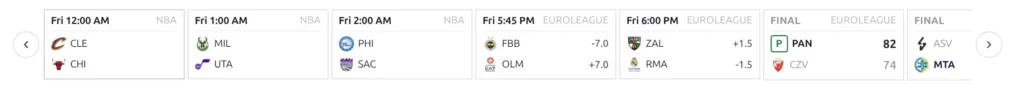 Scoreboard slider showing mini game cards in a horizontal carousel with navigation arrows