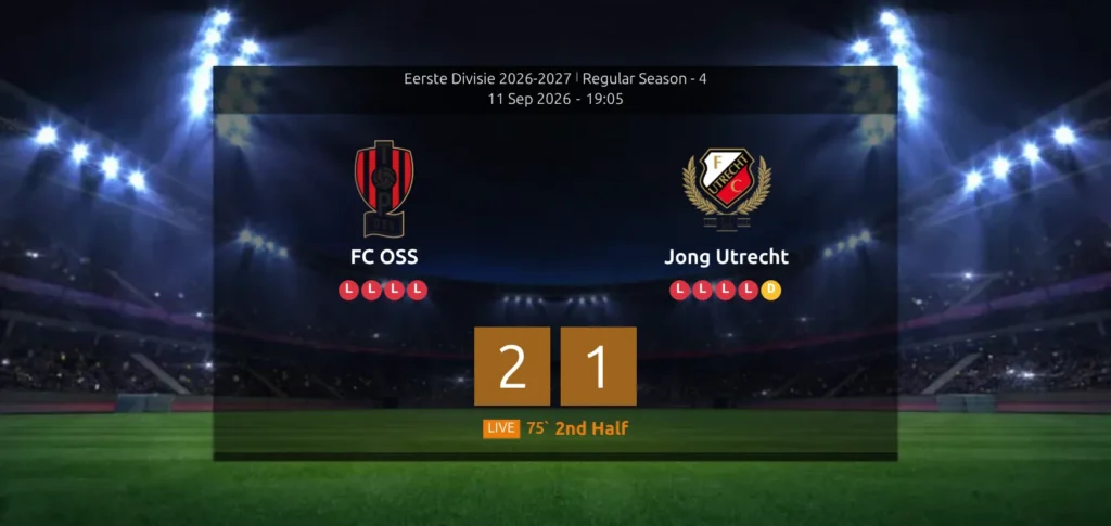 The top of a game page while the match is being played - a stadium-backed scoreboard with both clubs and their crests side by side, and below them a large live score panel showing 2 and 1 in big numerals on orange tiles, with an orange LIVE badge, a running minute and the label 2nd Half underneath